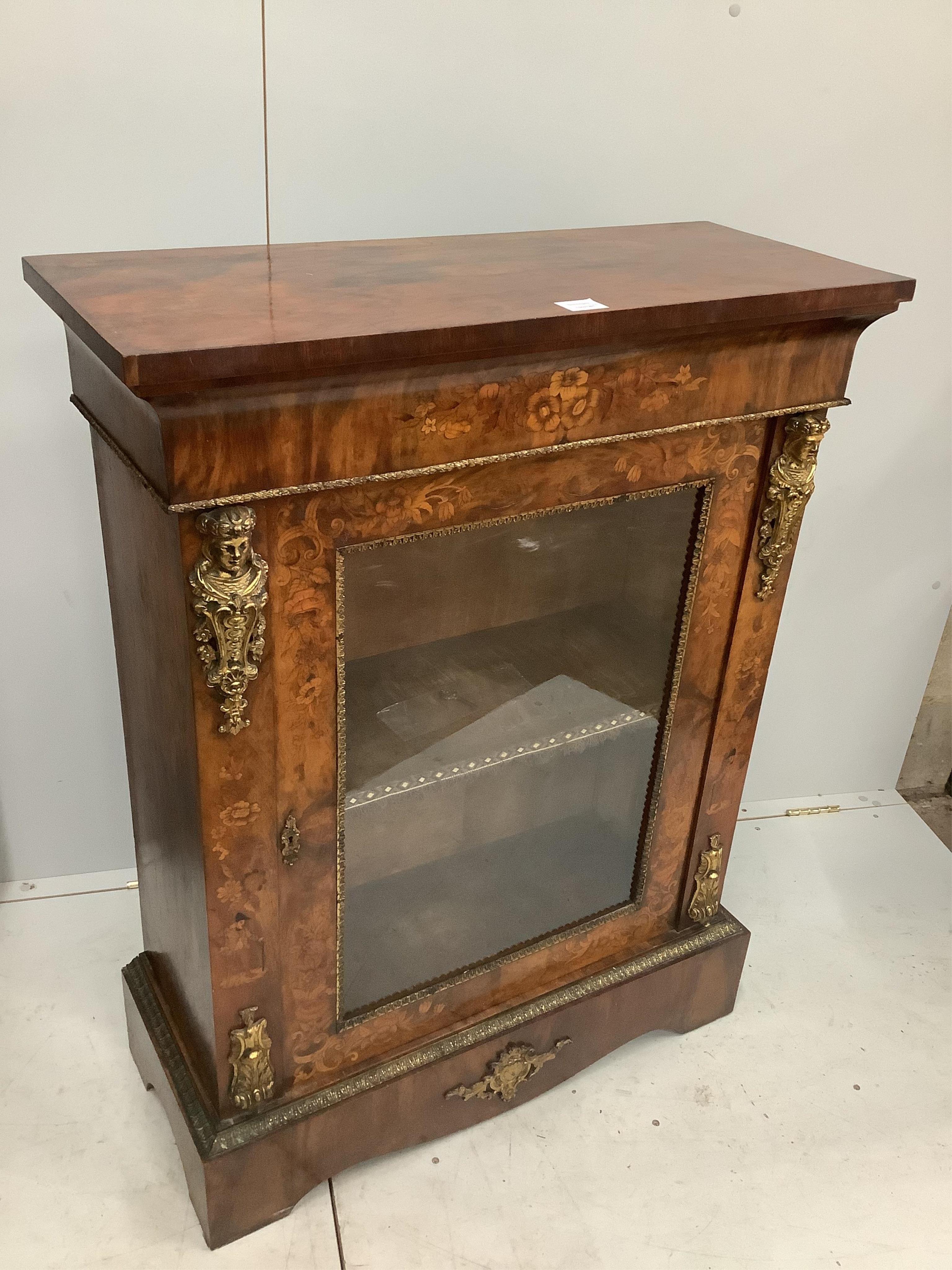 A Victorian walnut and floral marquetry inlaid gilt metal mounted pier cabinet, width 84cm, depth 34cm, height 110cm. Condition - fair